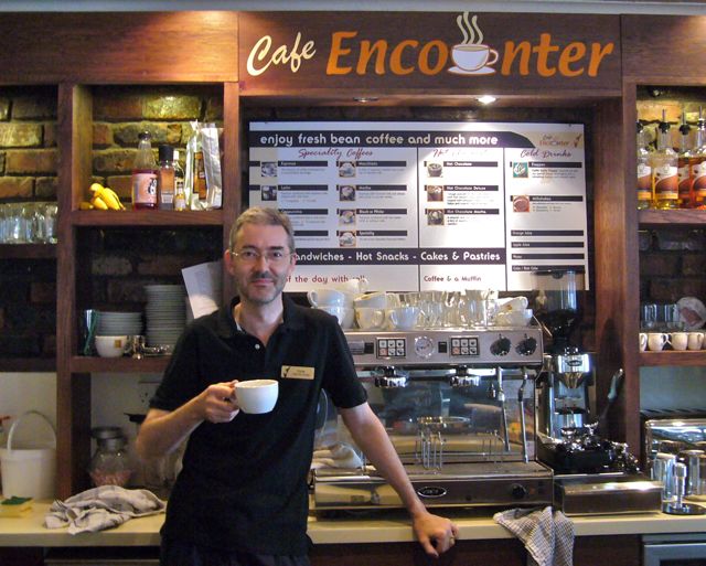 Chris F Carroll in 2012, with Cafe Encounter's Brazilia 2-Group Espresso Machine